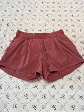 Lululemon Pink athletic Running shorts size 6